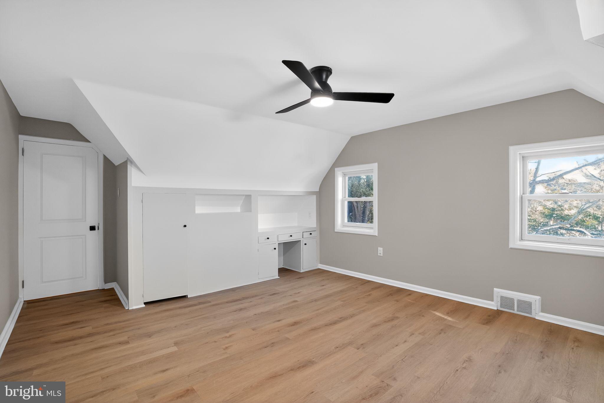 99 Rorer Street Glenside, PA 19038 - Photo 26 of 36 a view of empty room with wooden floor and fan