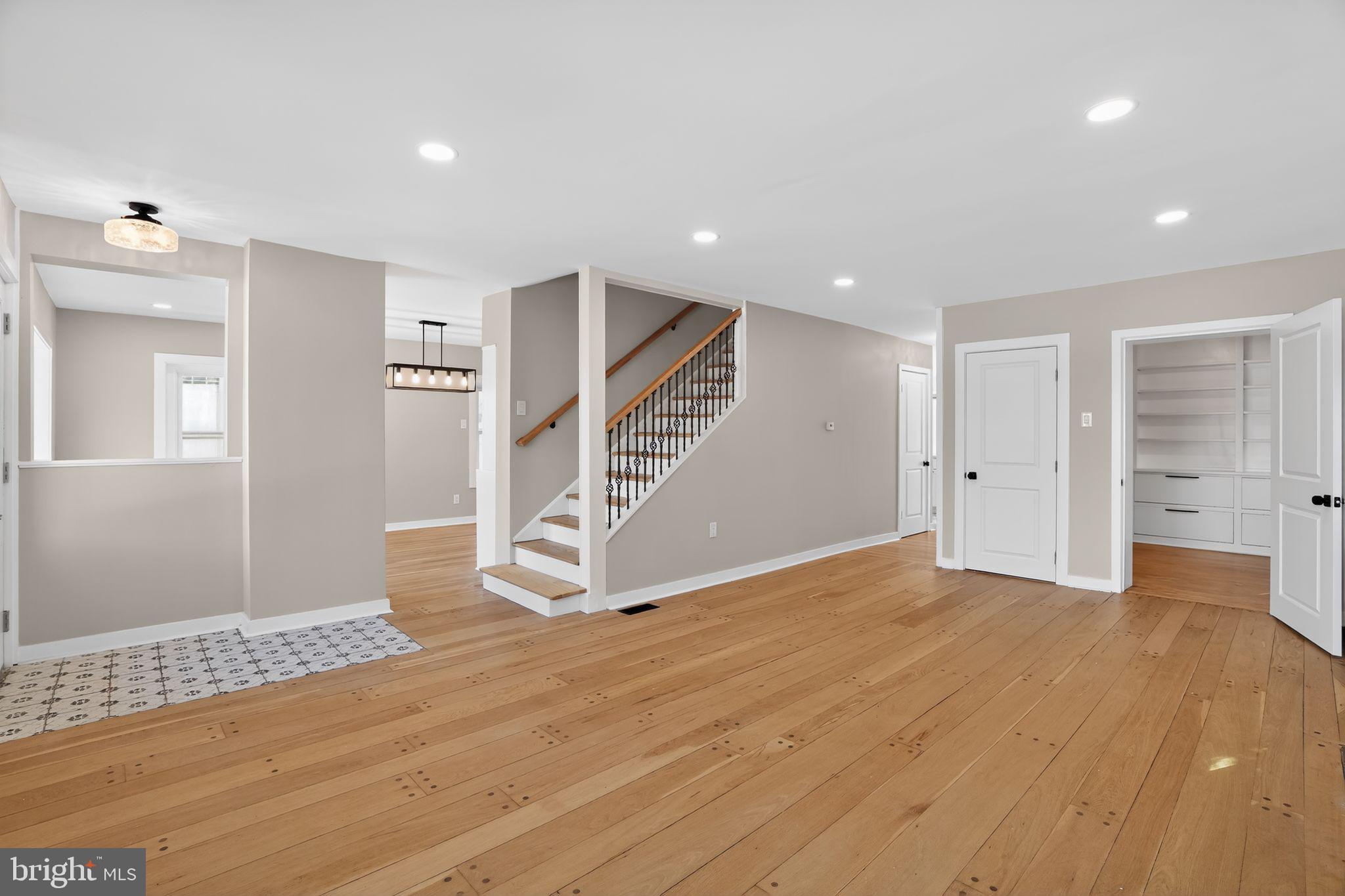 99 Rorer Street Glenside, PA 19038 - Photo 7 of 36 a view of an empty room with wooden floor and entryway
