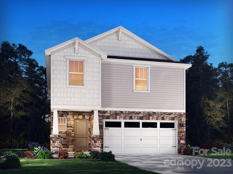 209 Canoga Avenue York, SC 29745 - Photo 1 of 18 a front view of a house with garden
