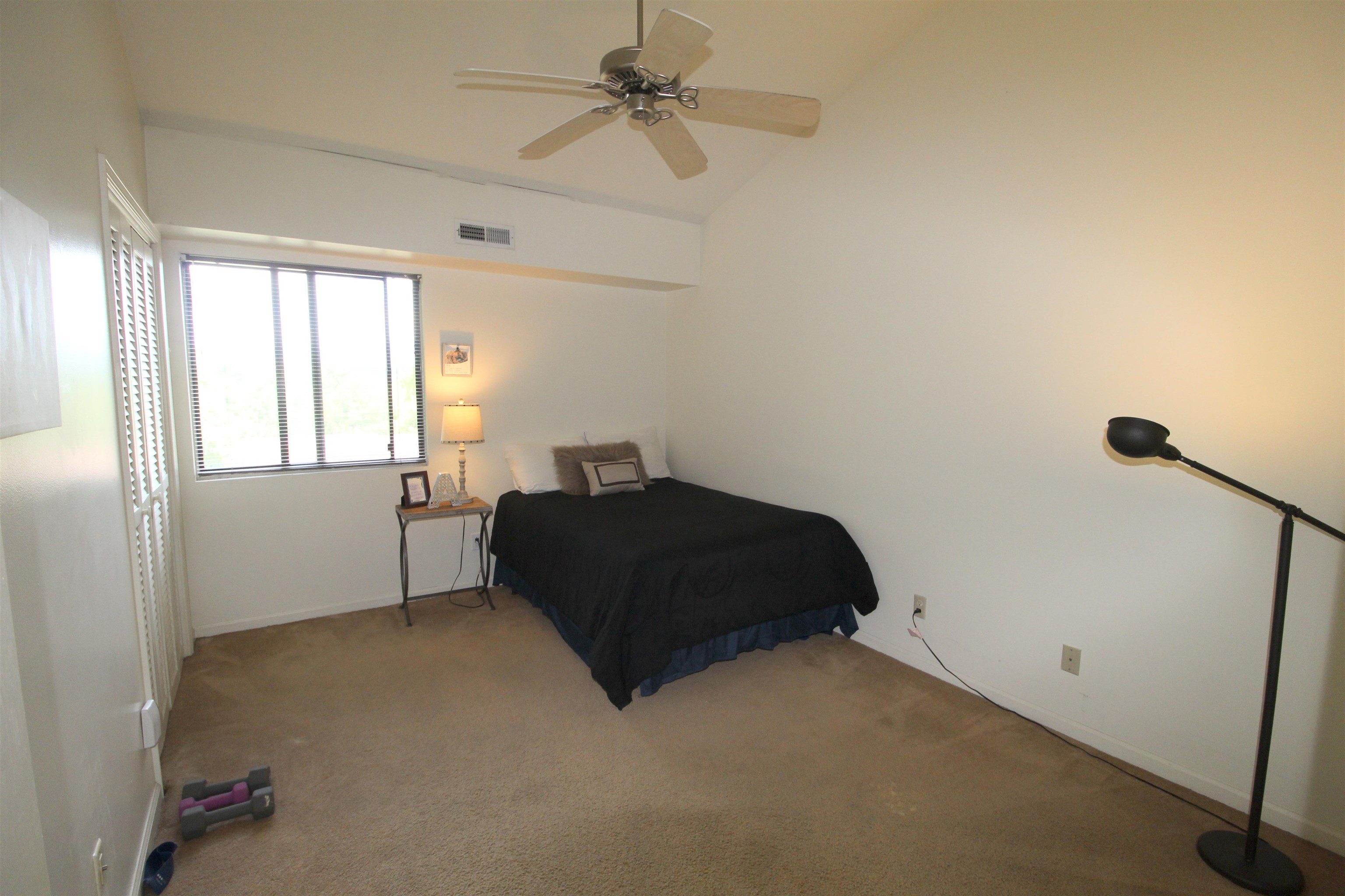 1116 Blue Ridge Drive, Unit 10 Harrisonburg, VA 22802 - Photo 14 of 20 a bedroom with a bed and a window