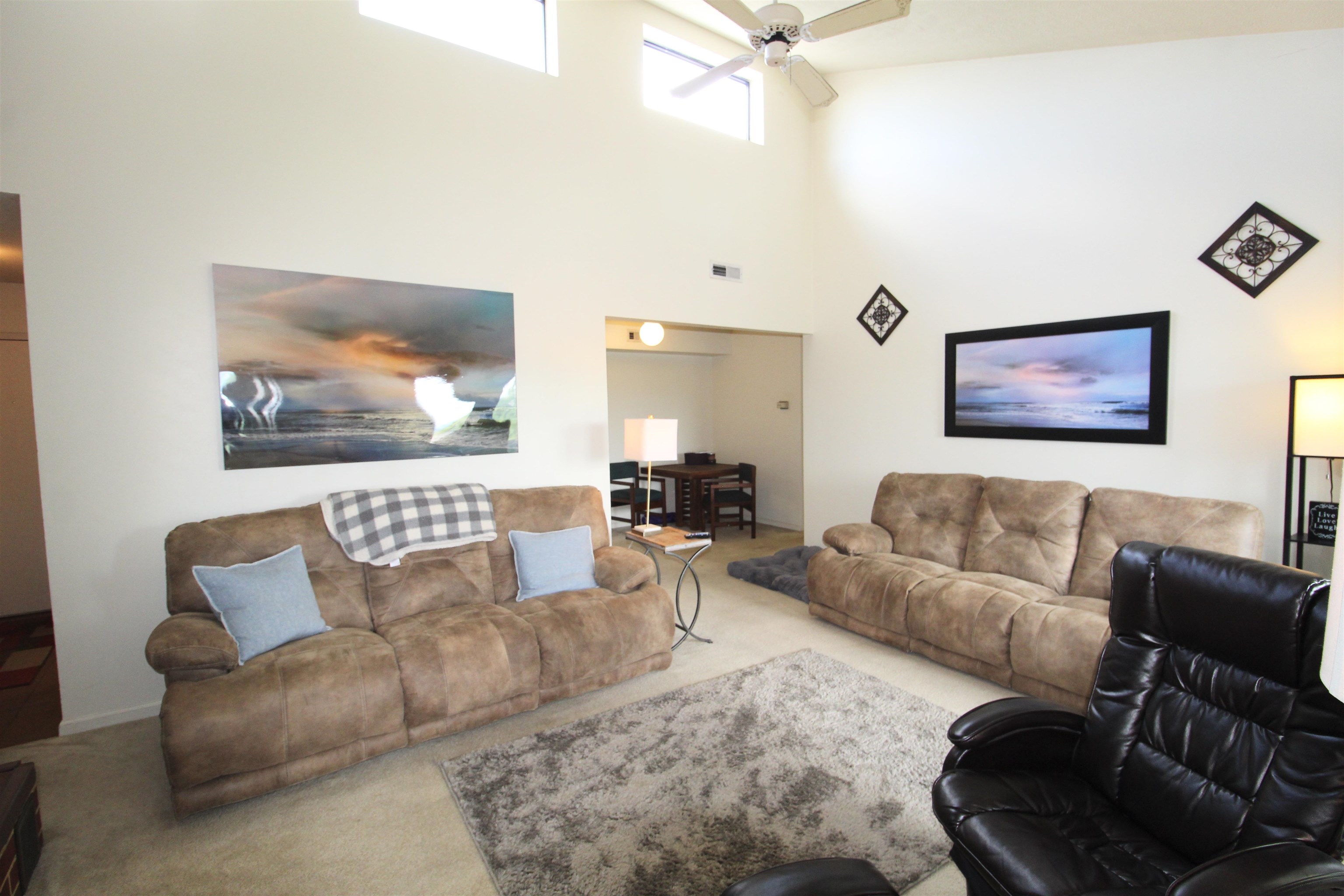 1116 Blue Ridge Drive, Unit 10 Harrisonburg, VA 22802 - Photo 4 of 20 a living room with furniture and a painting on the wall