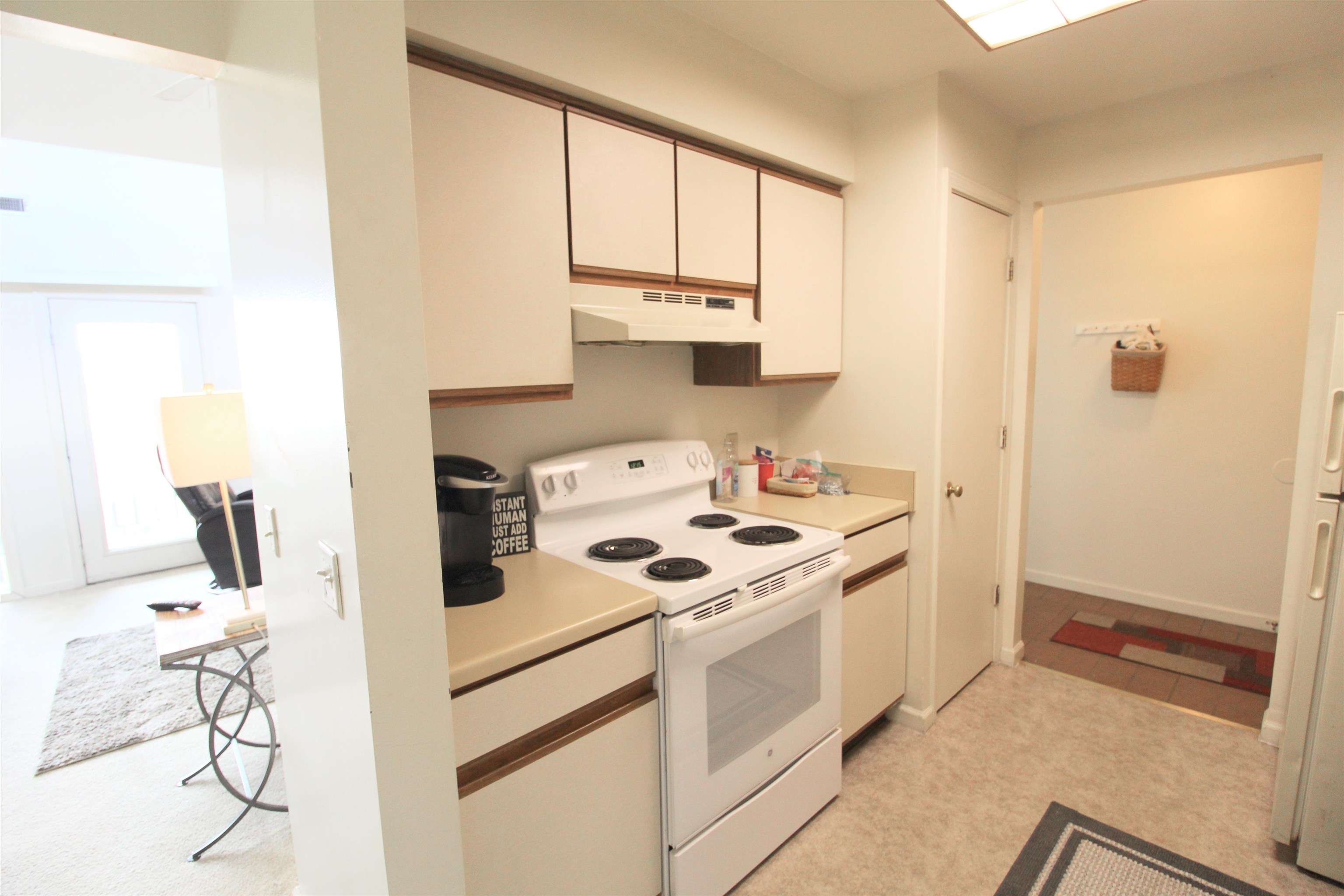 1116 Blue Ridge Drive, Unit 10 Harrisonburg, VA 22802 - Photo 7 of 20 a view of washer and dryer with kitchen in the background