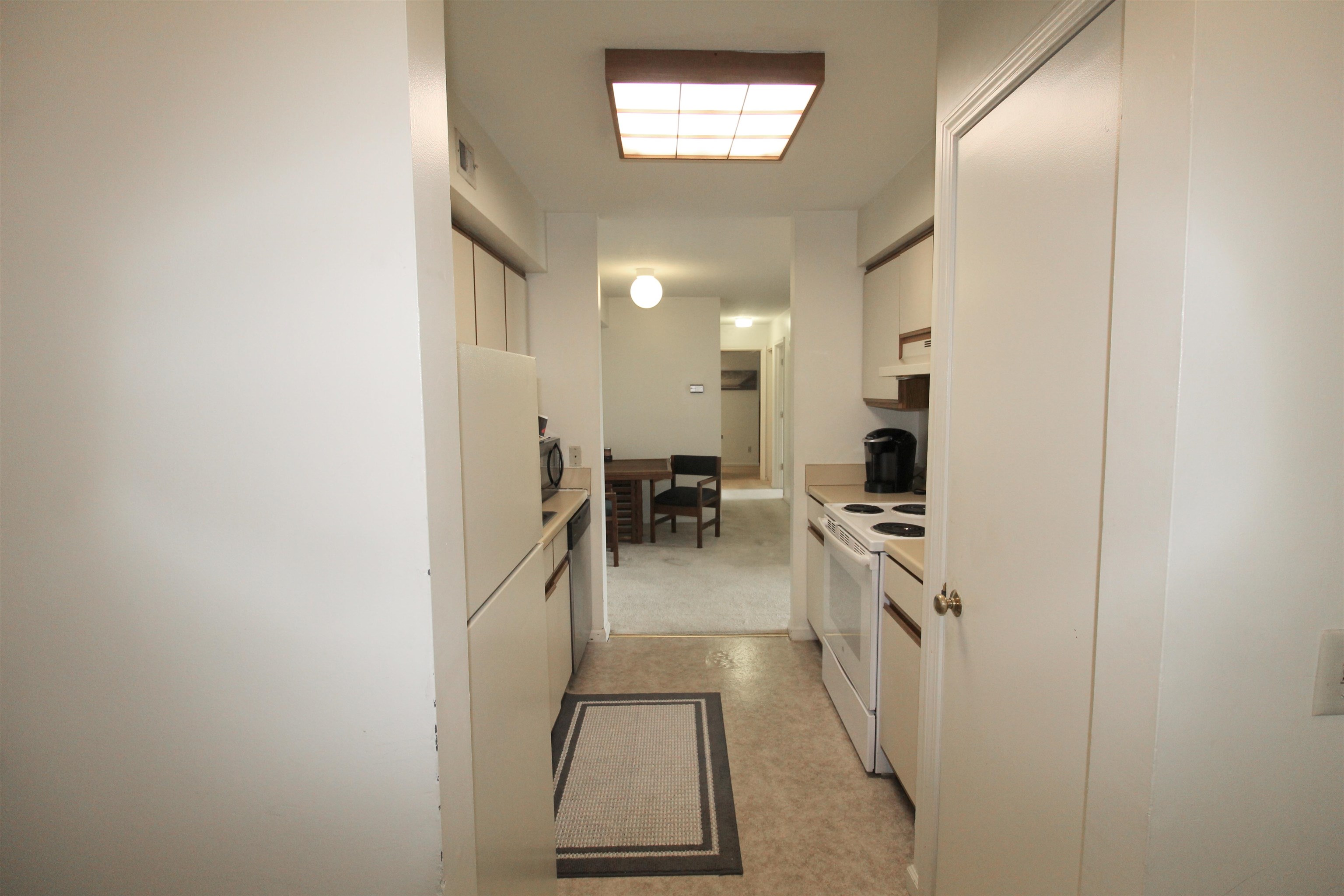 1116 Blue Ridge Drive, Unit 10 Harrisonburg, VA 22802 - Photo 9 of 20 a kitchen with a refrigerator and a stove