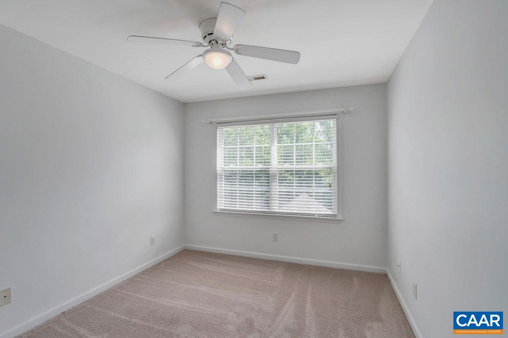 2041 Ridgetop Drive Charlottesville, VA 22903 - Photo 36 of 54 an empty room with a window