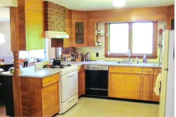 83 Bray Road Buckland, MA 01370 - Photo 3 of 6 a kitchen with stainless steel appliances granite countertop a sink stove and refrigerator