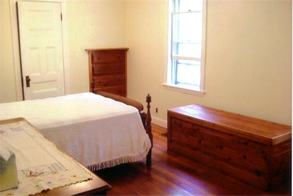 83 Bray Road Buckland, MA 01370 - Photo 4 of 6 a bedroom with a bed and a window