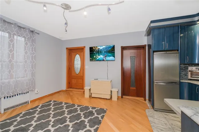 a bedroom with furniture and window