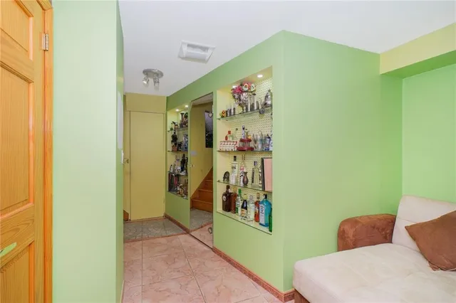 a bathroom with sink and mirror