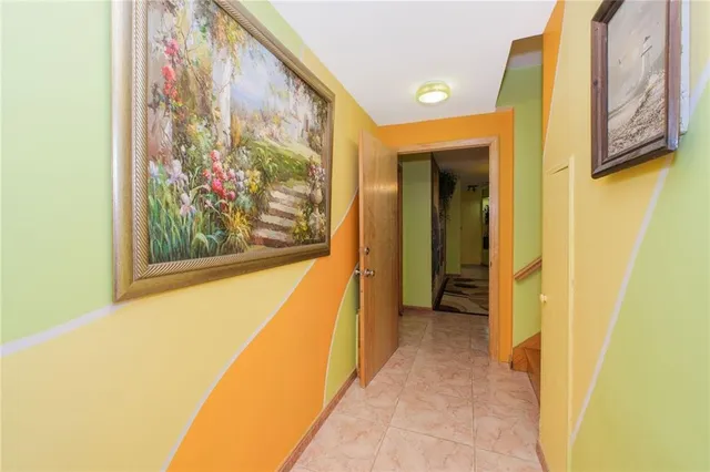 a view of a bathroom with a bathtub