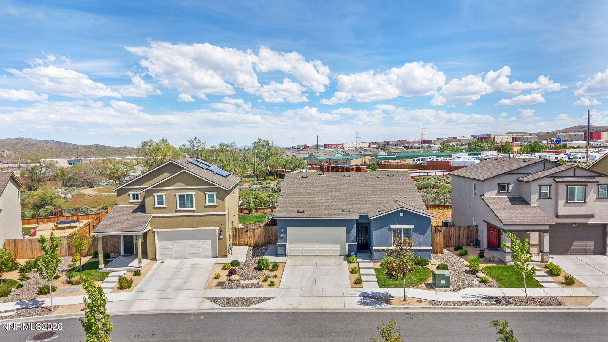 9708 Sea Glass Drive Reno, NV 89506 - Photo 43 of 51 an aerial view of residential houses with cars parked