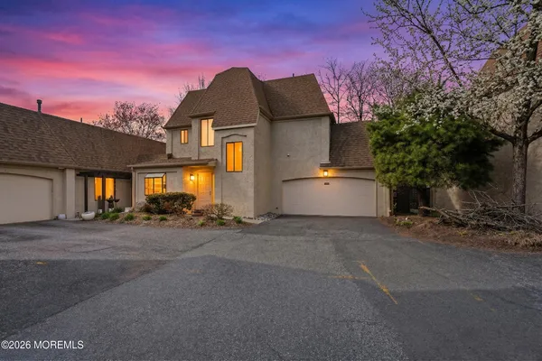 a view of a house with a street