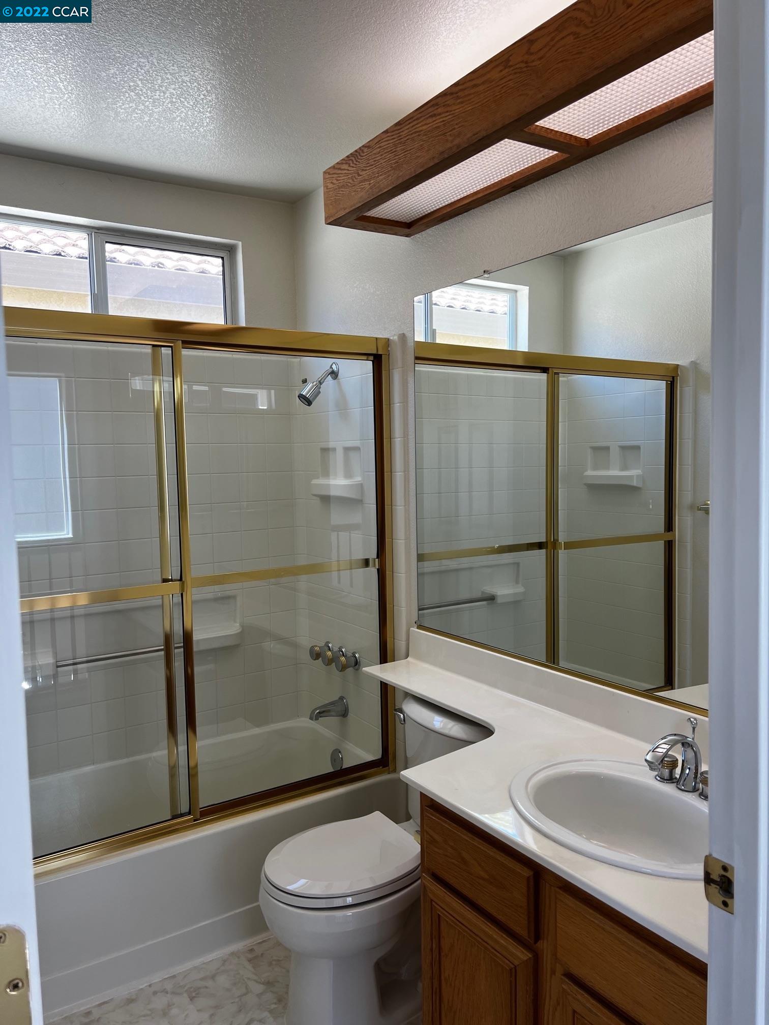 1136 Vista Pointe Circle San Ramon, CA 94583 - Photo 19 of 26 a bathroom with a sink a toilet and shower