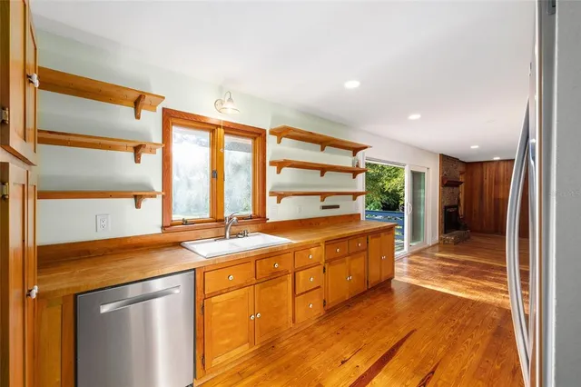 a view of storage and utility room with washer and dryer
