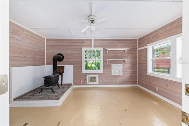 a view of park with wooden fence