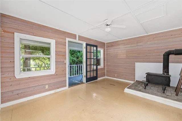 a view of park with wooden fence