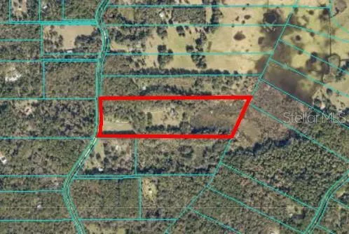 a view of a wooden fence