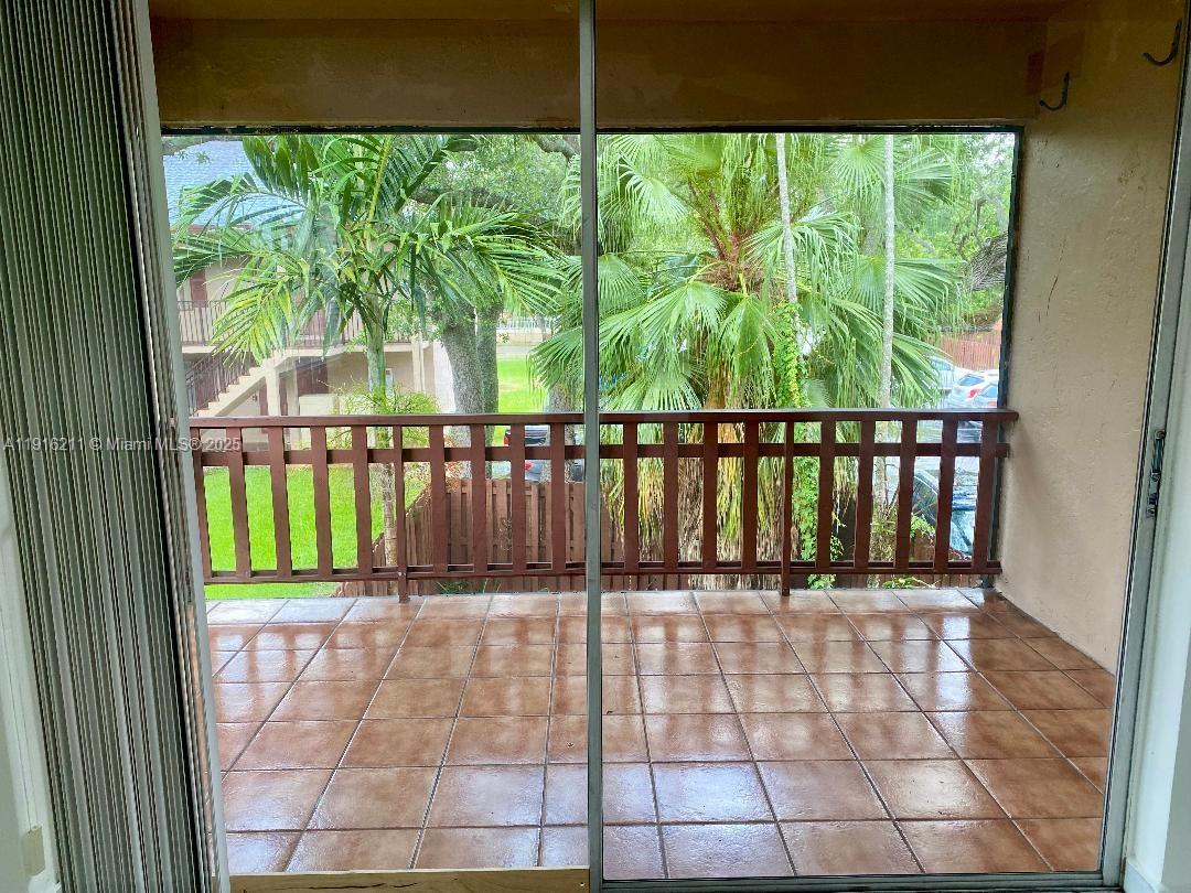 11287 Southwest 88th Street, Unit 209L Miami, FL 33173 - Photo 4 of 16 a view of a balcony