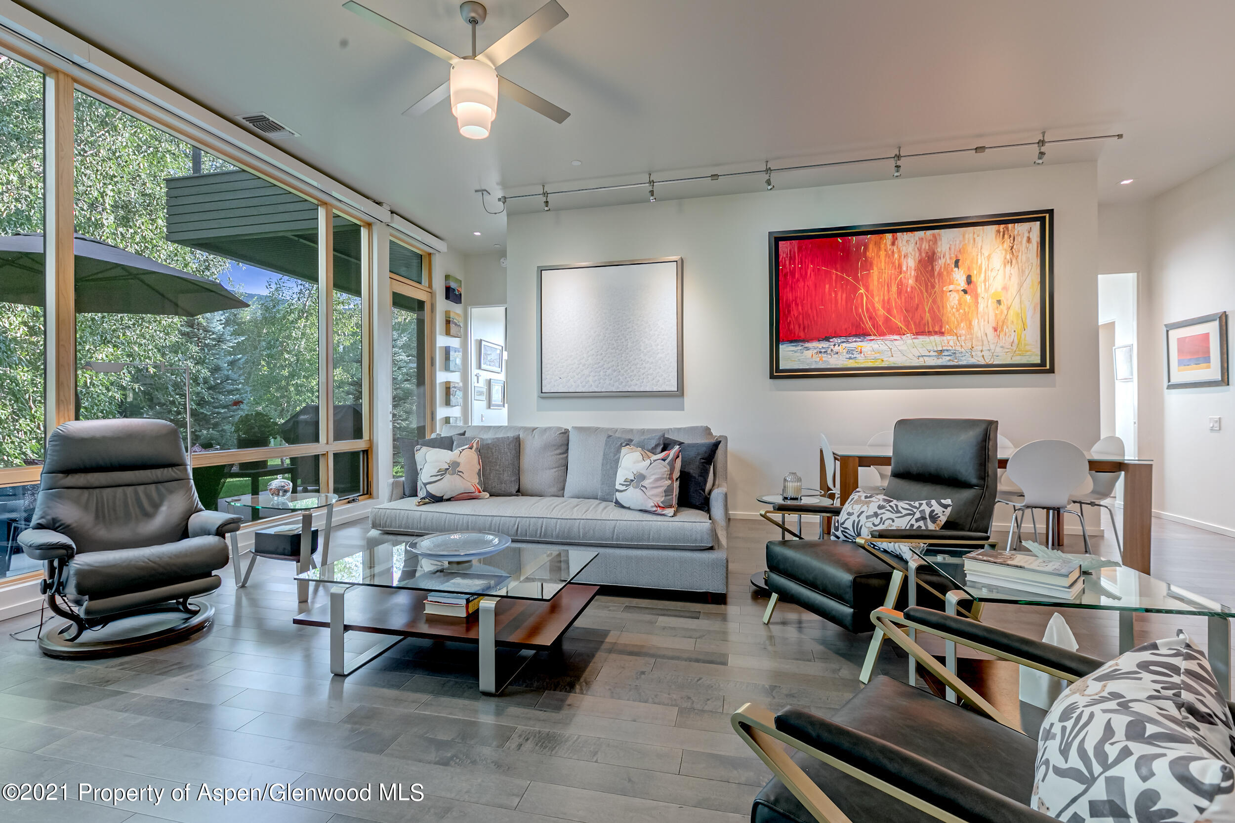 104 Evans Road, Unit 108 Basalt, CO 81621 - Photo 5 of 20 a living room with furniture and a flat screen tv