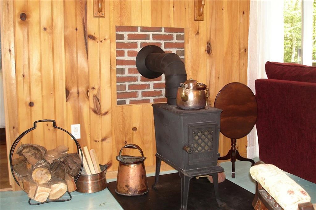 23 Ledgemere Road Orrs Island, ME 04066 - Photo 7 of 14 A very efficient wood stove provides...