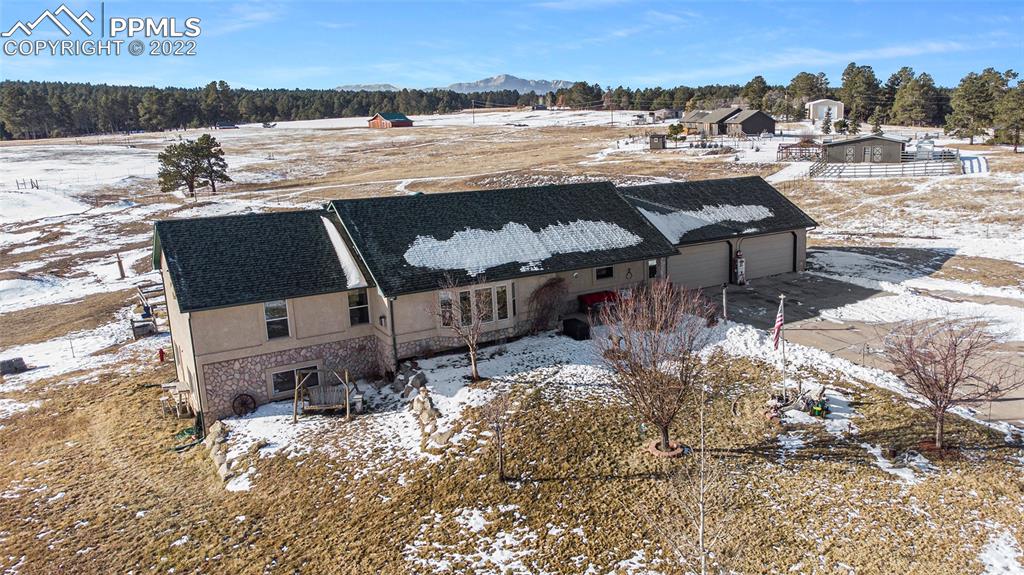 10695 Walker Road Colorado Springs, CO 80908 - Photo 45 of 49 a view of a terrace with outdoor space