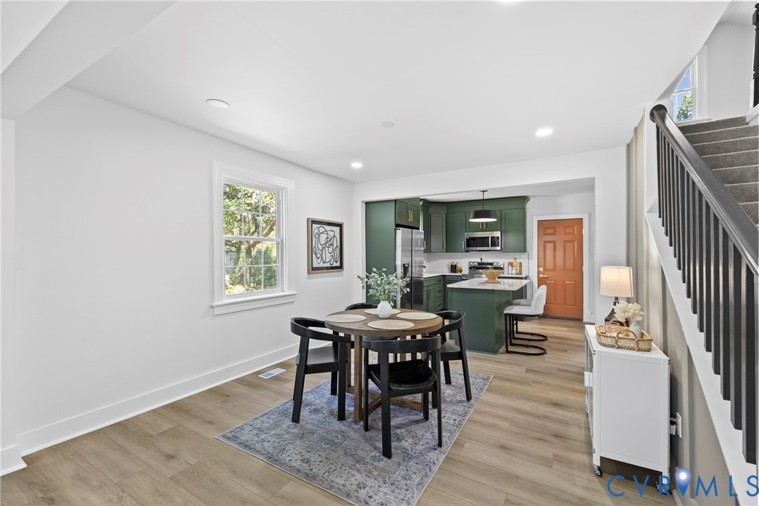 821 Fort Lee Road Petersburg, VA 23803 - Photo 6 of 45 Open concept living area featuring wood-finish flo