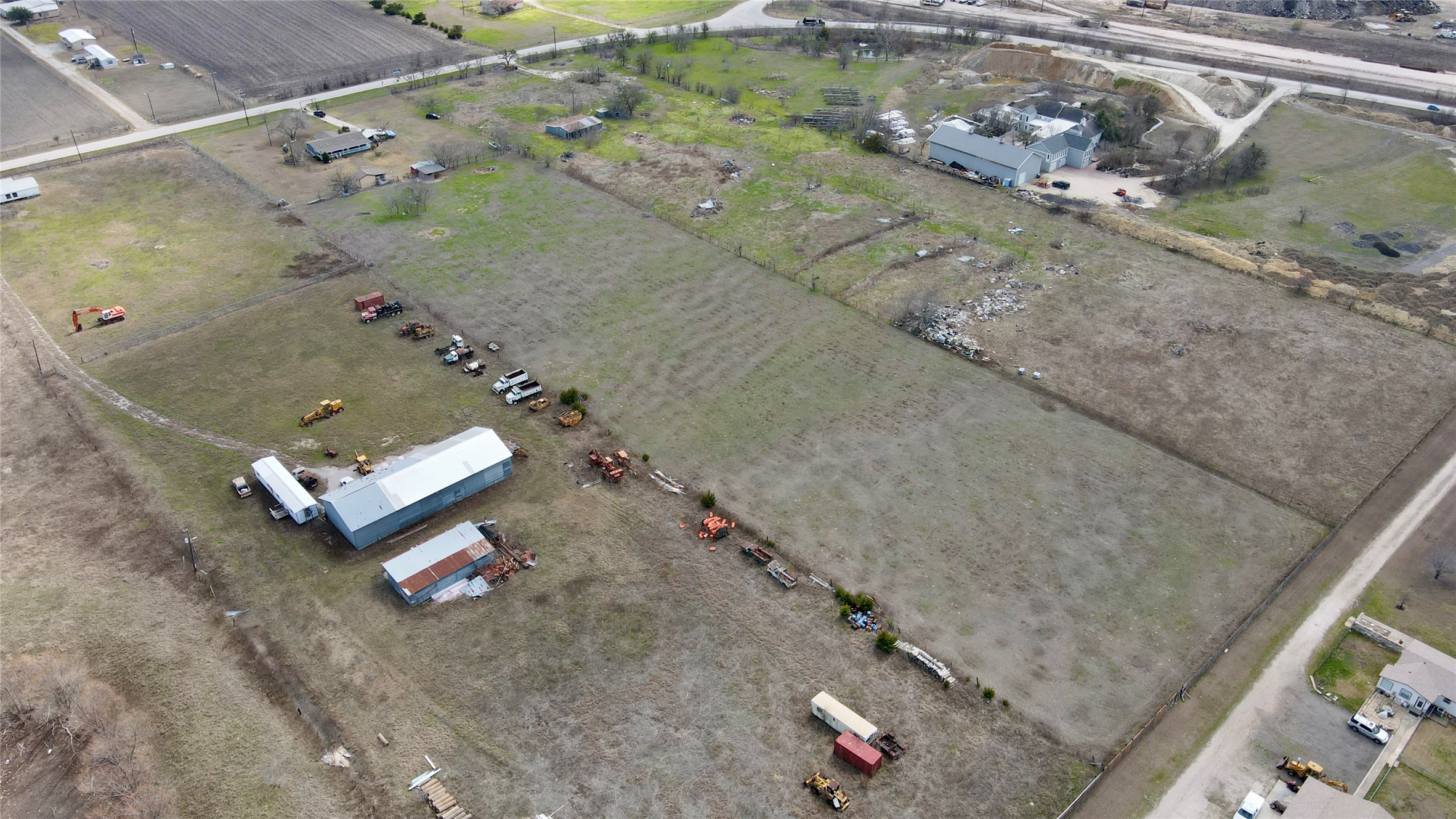 12322 Old Kimbro Road Manor, TX 78653 - Photo 15 of 18 an aerial view of a house with a backyard