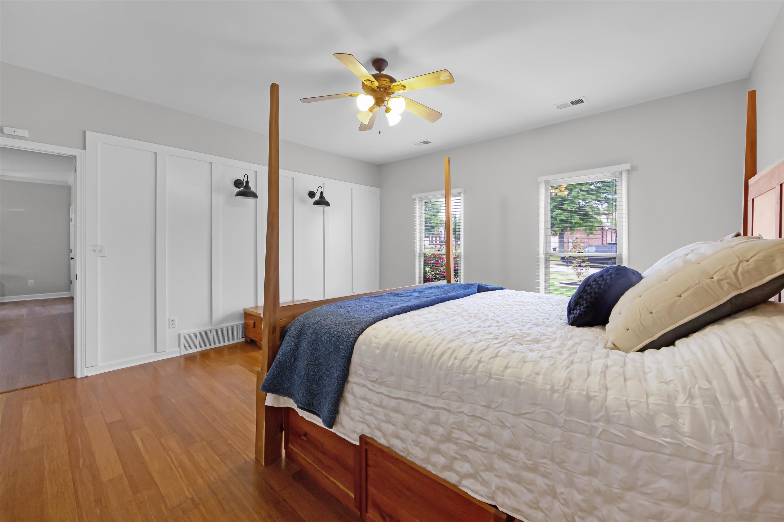1331 Wahkin Road Collierville, TN 38017 - Photo 12 of 25 a bedroom with a bed and wooden floor