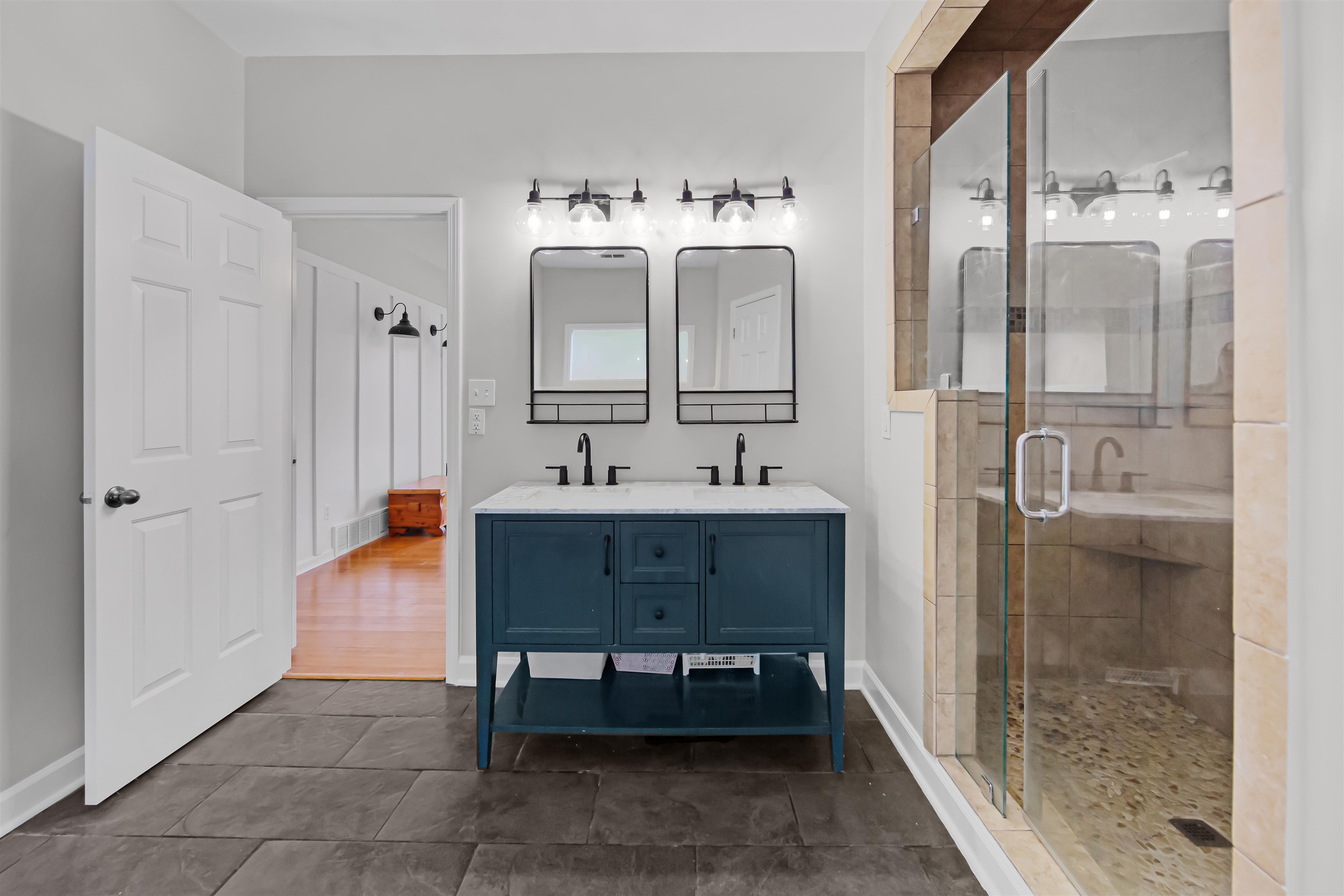 1331 Wahkin Road Collierville, TN 38017 - Photo 13 of 25 a bathroom with a sink and a mirror