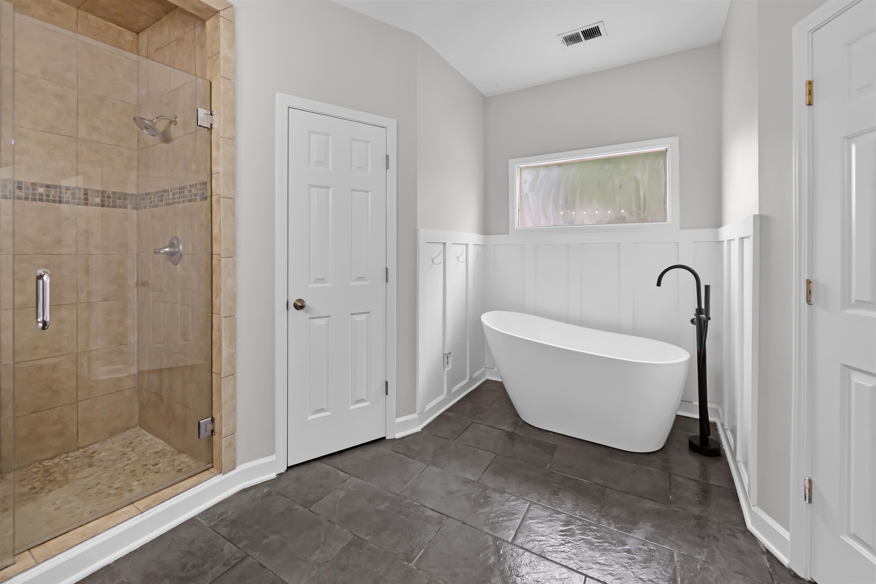 1331 Wahkin Road Collierville, TN 38017 - Photo 14 of 25 a bathroom with a bathtub and shower