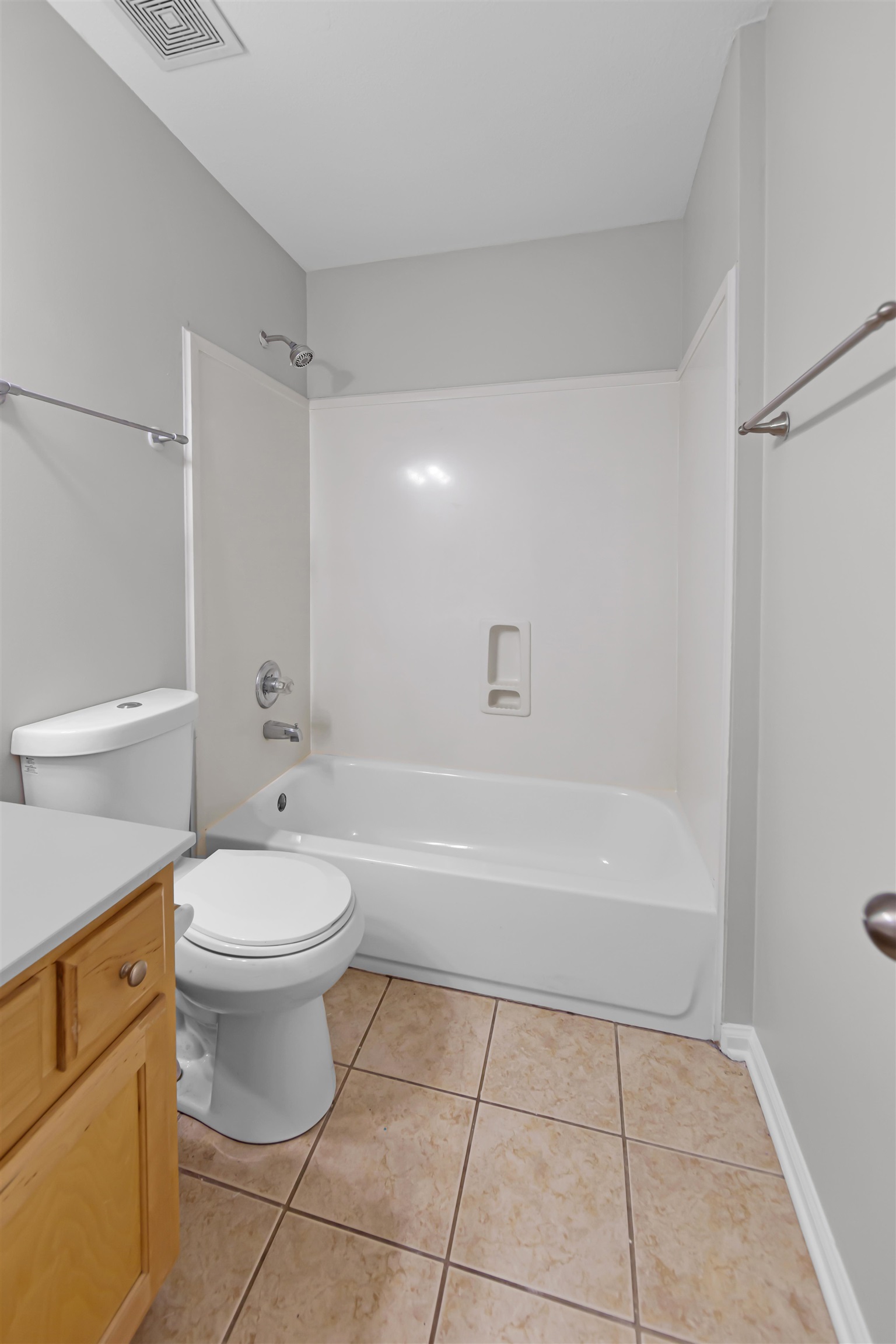 1331 Wahkin Road Collierville, TN 38017 - Photo 18 of 25 a bathroom with a toilet a sink and bathtub