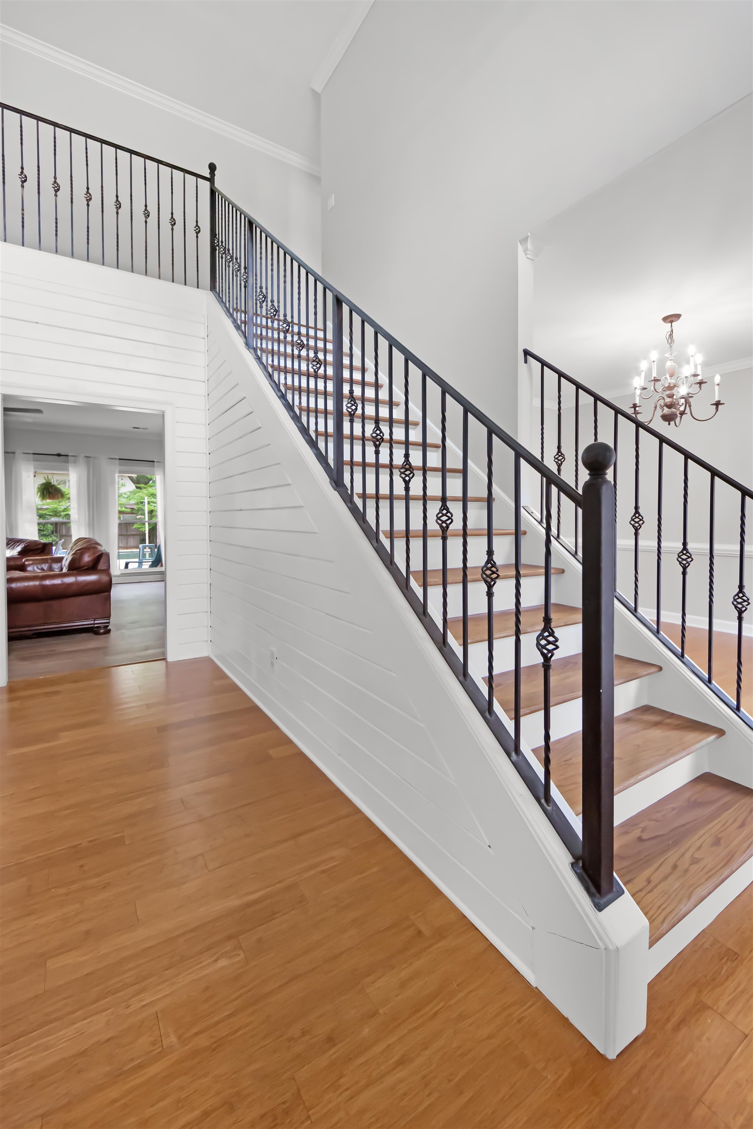 1331 Wahkin Road Collierville, TN 38017 - Photo 2 of 25 a view of a hallway with bedroom and wooden floor