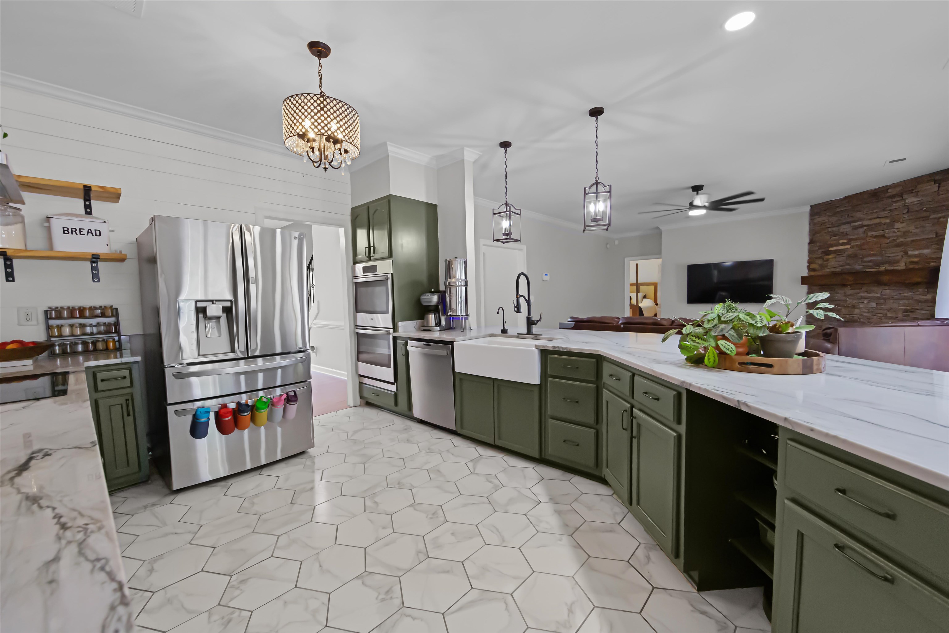1331 Wahkin Road Collierville, TN 38017 - Photo 8 of 25 a kitchen with refrigerator and cabinets