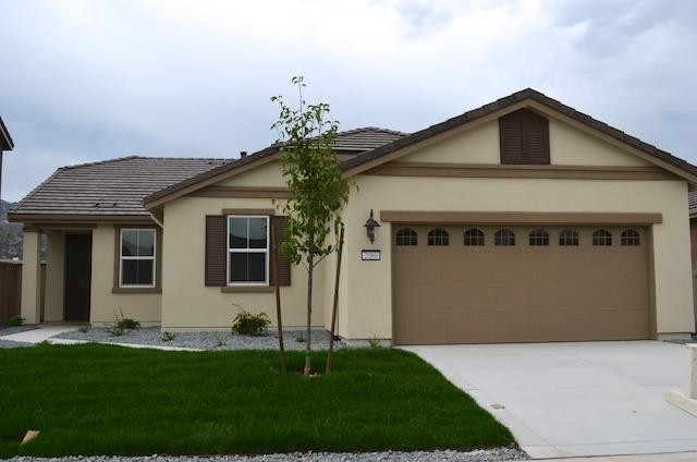 2225 Walnut Rdg Court Reno, NV 89521 - Photo 1 of 1 a front view of a house with a yard