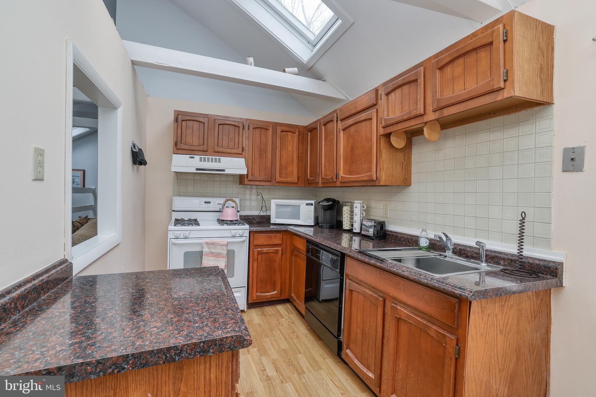 5496 York Rd., Unit CARRIAGE Doylestown, PA 18902 - Photo 18 of 34 A Skylight provides Additional Kitchen Light