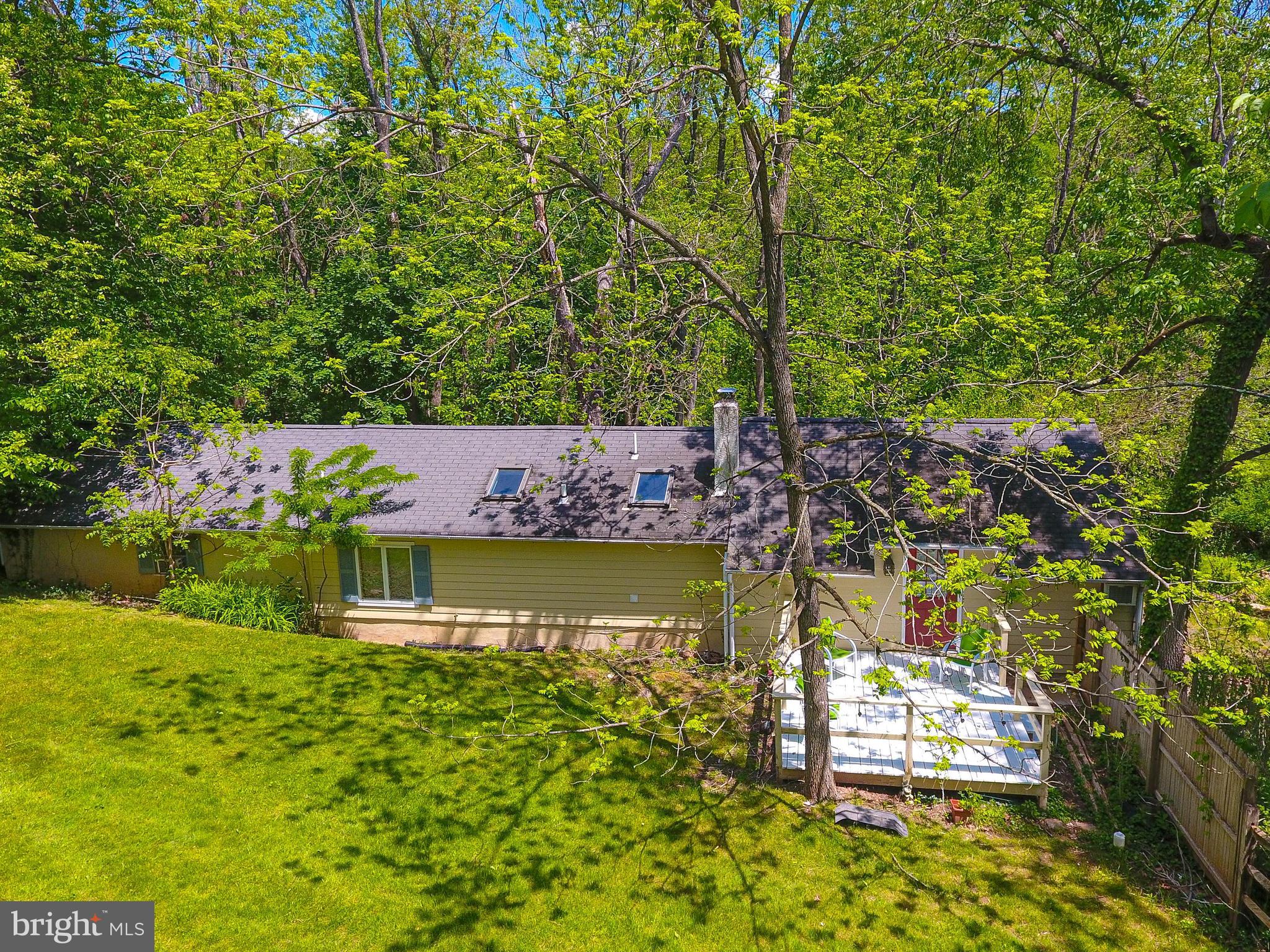 5496 York Rd., Unit CARRIAGE Doylestown, PA 18902 - Photo 8 of 34 Rear Exterior And Wooded Backdrop