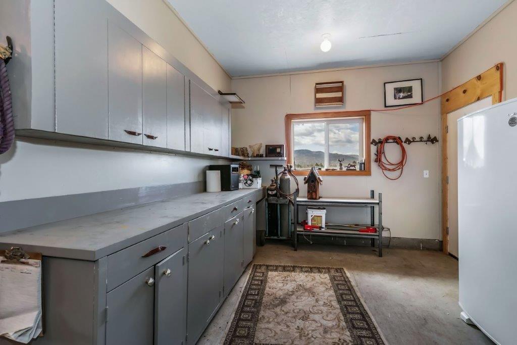 10572 Fleming Road Powell Butte, OR 97753 - Photo 41 of 54 Finished, heated & lots of storage