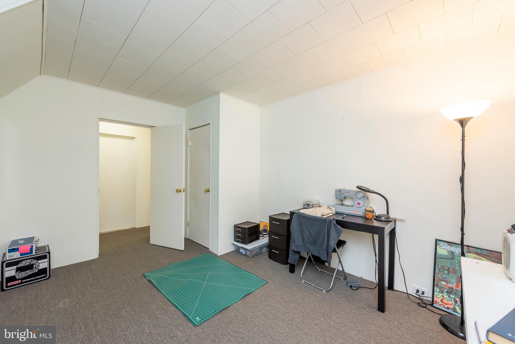 811 Dorchester Road Baltimore, MD 21229 - Photo 26 of 45 a view of a workspace with furniture