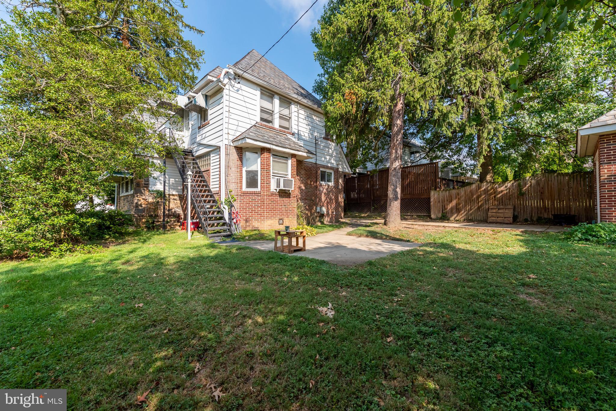 811 Dorchester Road Baltimore, MD 21229 - Photo 41 of 45 a view of a house with a backyard