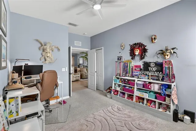 a kitchen with stainless steel appliances granite countertop a stove top oven a sink dishwasher a dining table and chairs