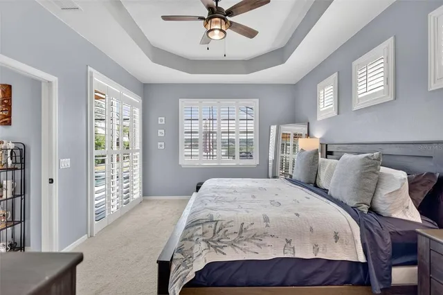 a bathroom with a double vanity sink mirror and shower
