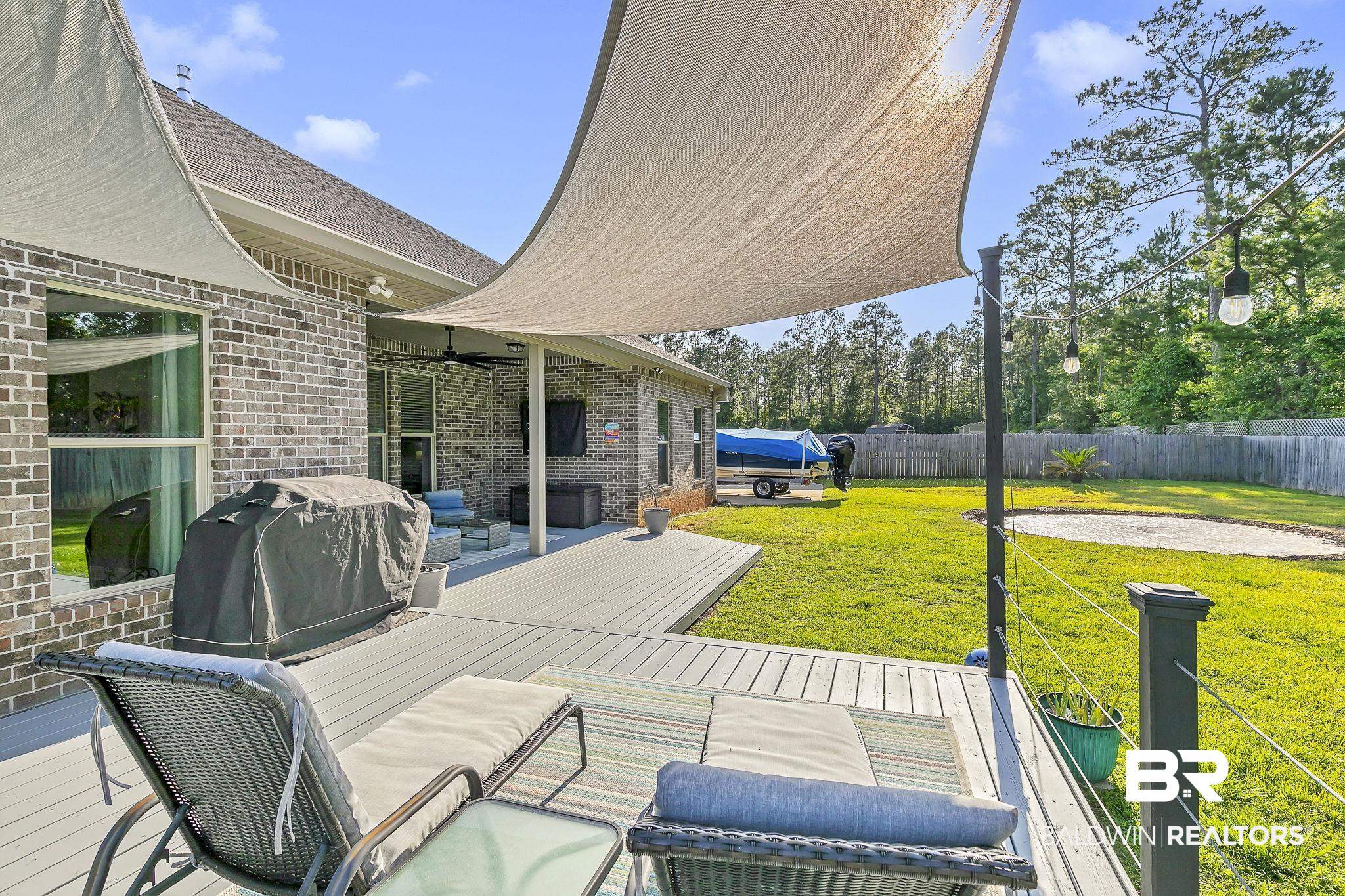 30635 Drayton Court Daphne, AL 36527 - Photo 40 of 51 Deck featuring ceiling fan and grilling area
