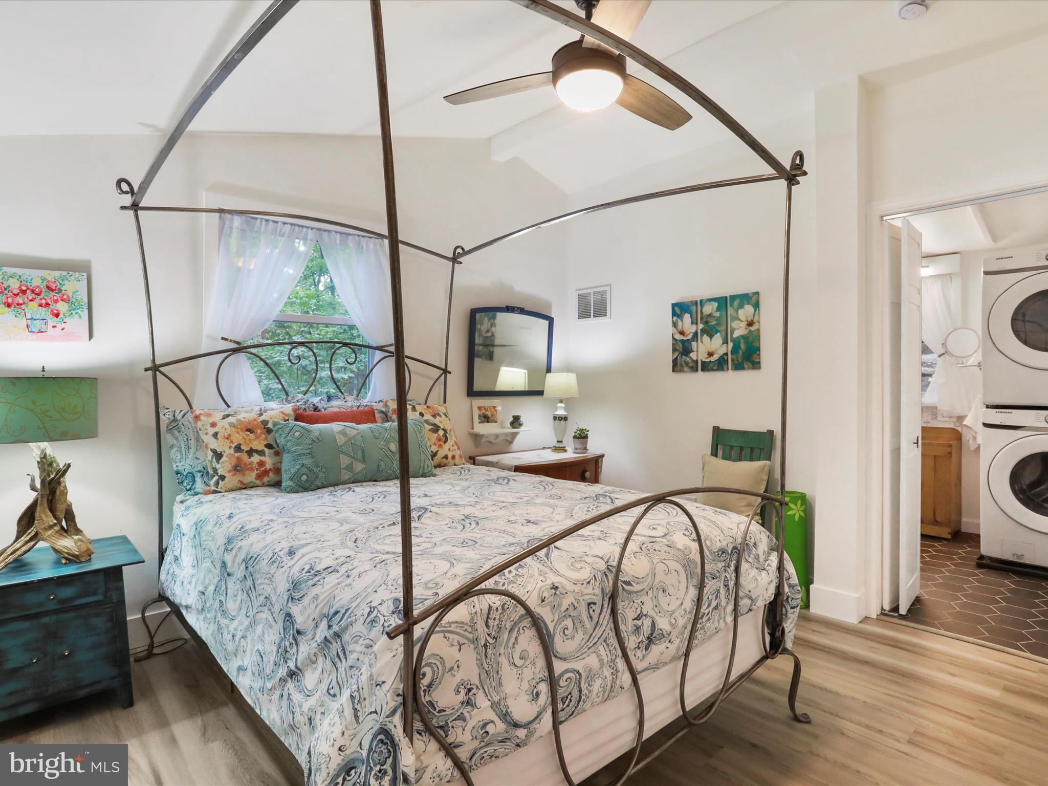 570 Cedar Road Strasburg, VA 22657 - Photo 12 of 47 a bedroom with a bed a couch and dresser