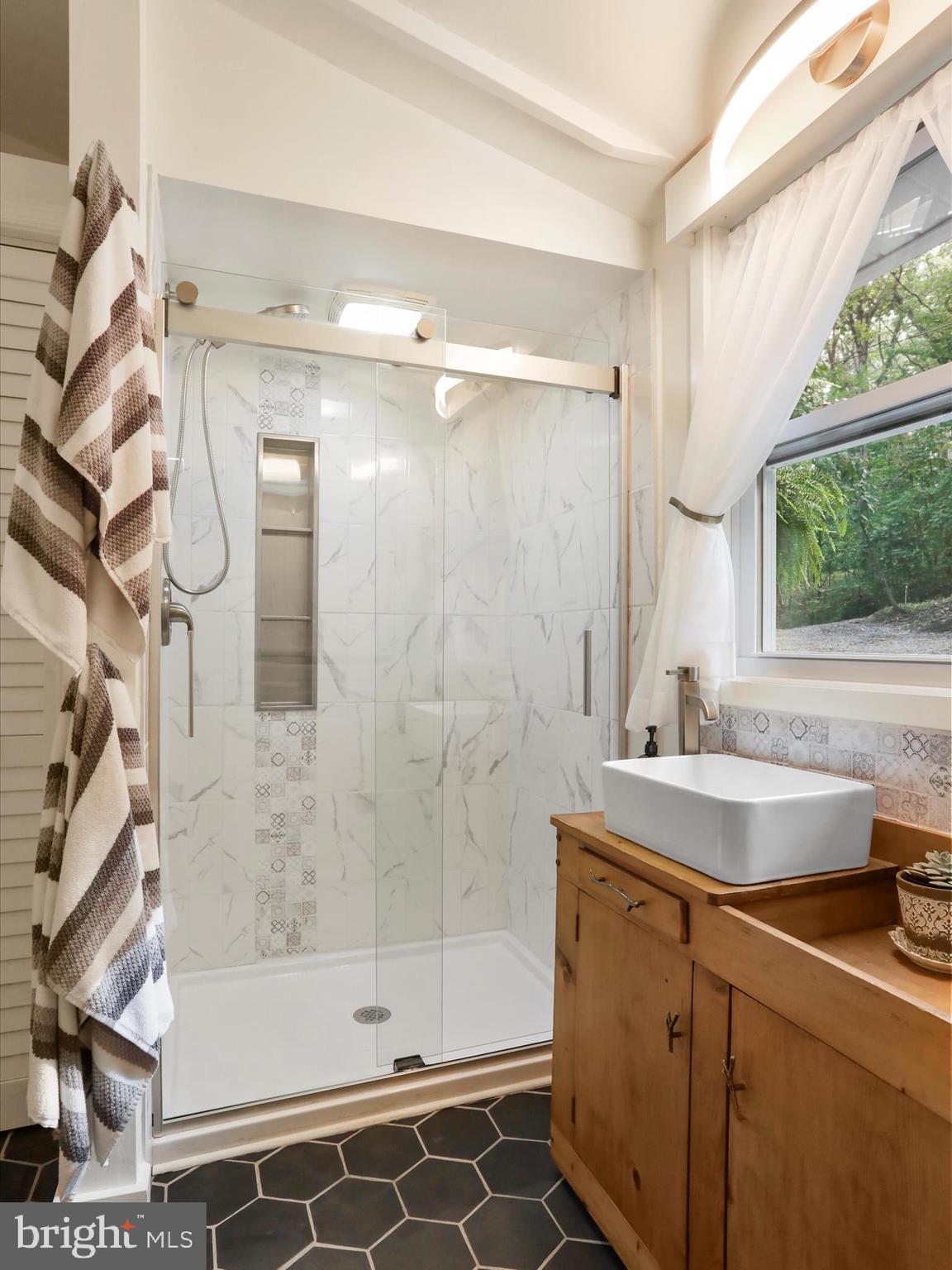 570 Cedar Road Strasburg, VA 22657 - Photo 17 of 47 a bathroom with a sink and a mirror
