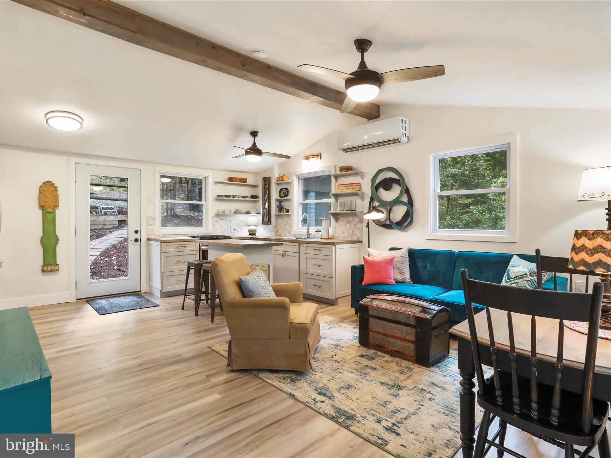 570 Cedar Road Strasburg, VA 22657 - Photo 20 of 47 a living room with furniture and a large window