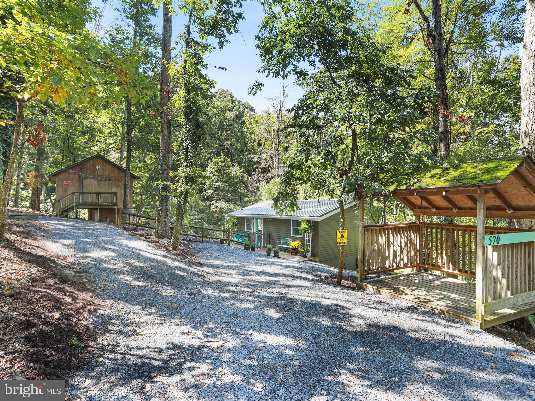 570 Cedar Road Strasburg, VA 22657 - Photo 33 of 47 a front view of a house with a yard and tree
