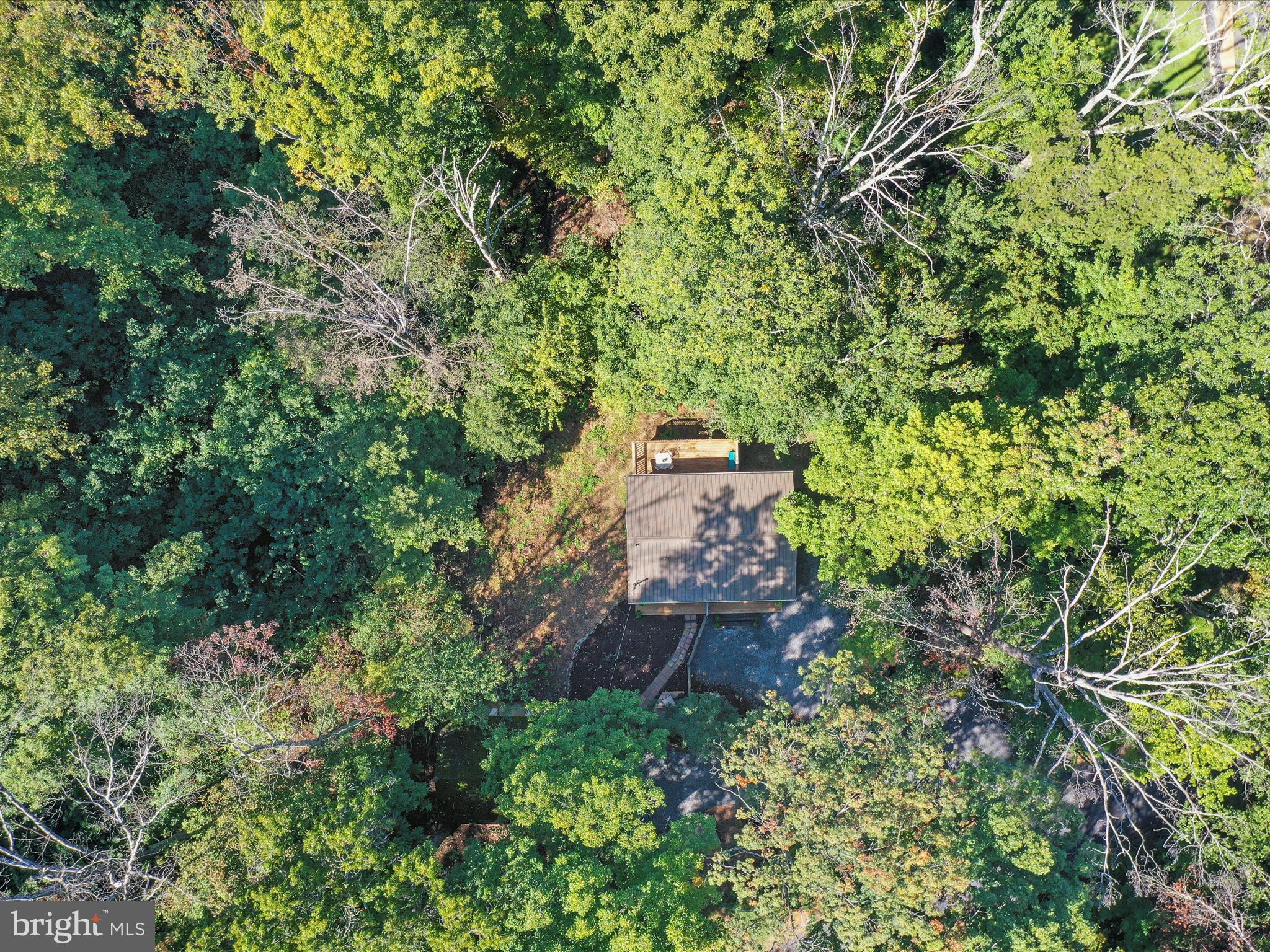 570 Cedar Road Strasburg, VA 22657 - Photo 39 of 47 an aerial view of a house with a yard