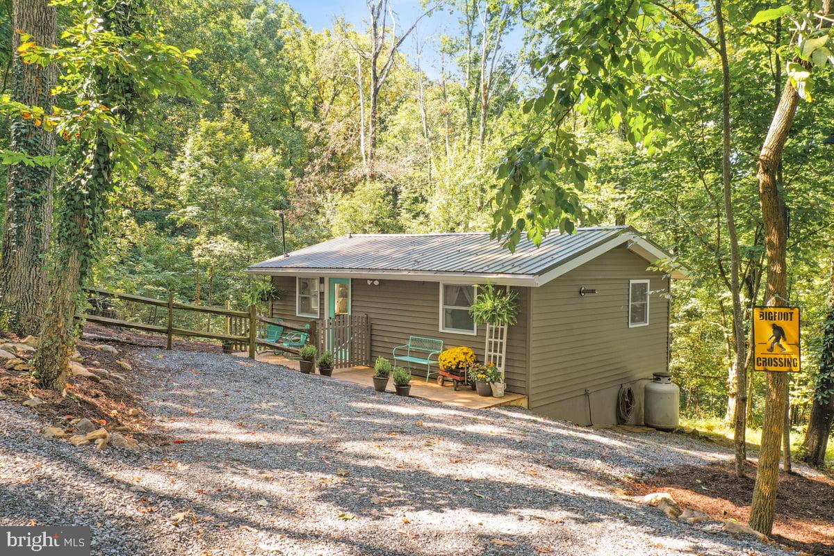 570 Cedar Road Strasburg, VA 22657 - Photo 42 of 47 a view of a house with backyard