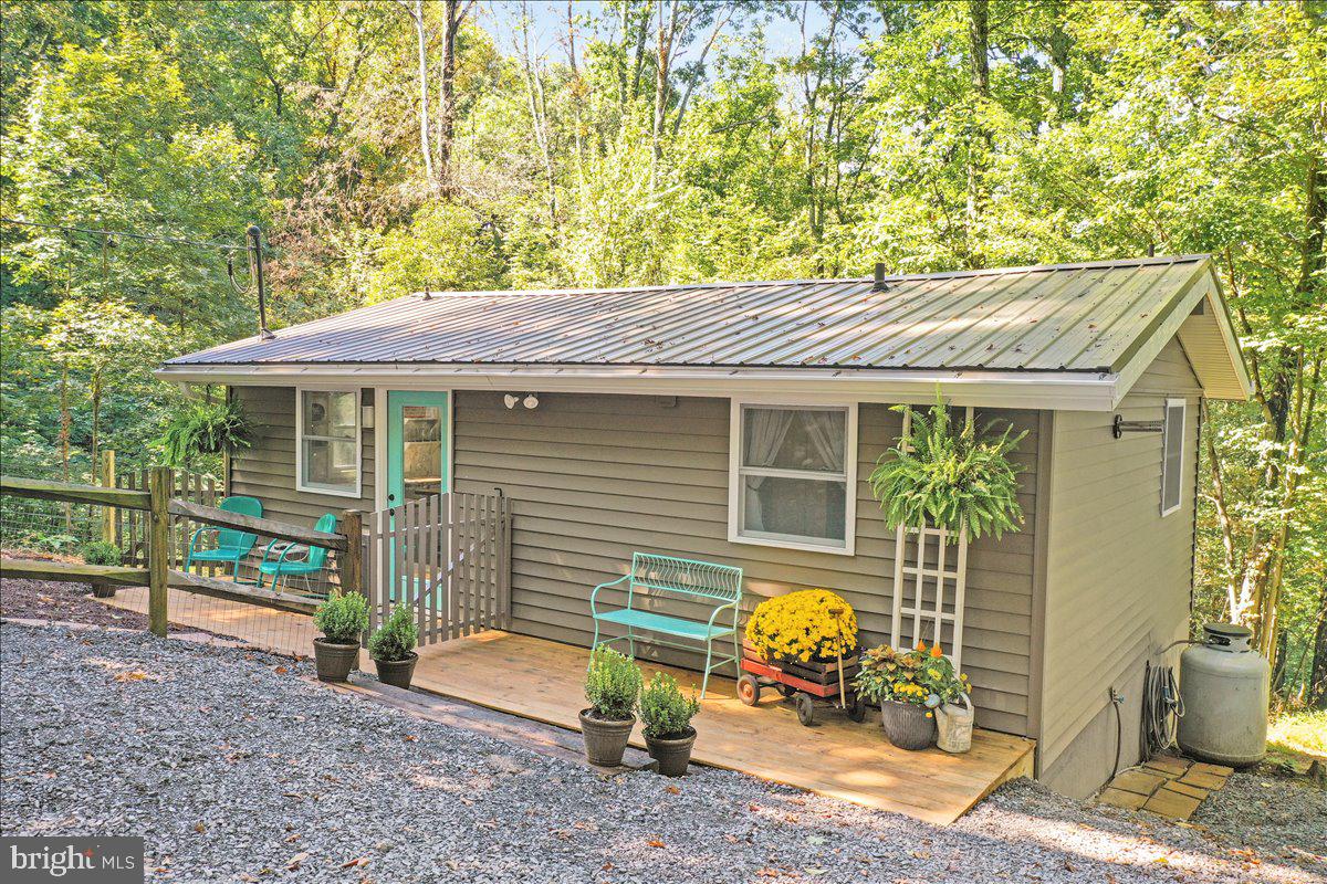 570 Cedar Road Strasburg, VA 22657 - Photo 45 of 47 a front view of a house with patio