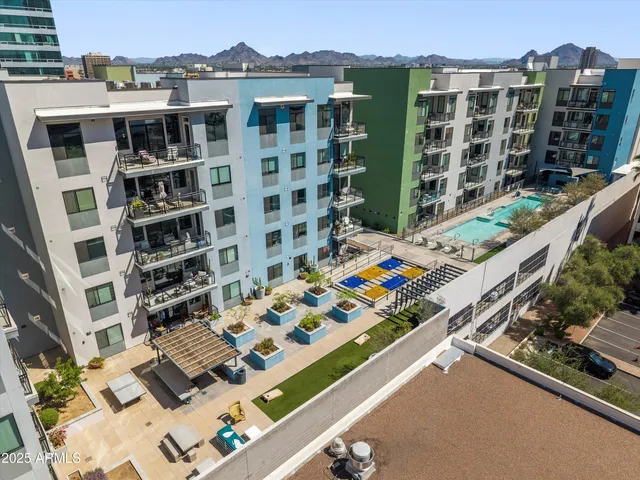 a view of multiple houses with a patio