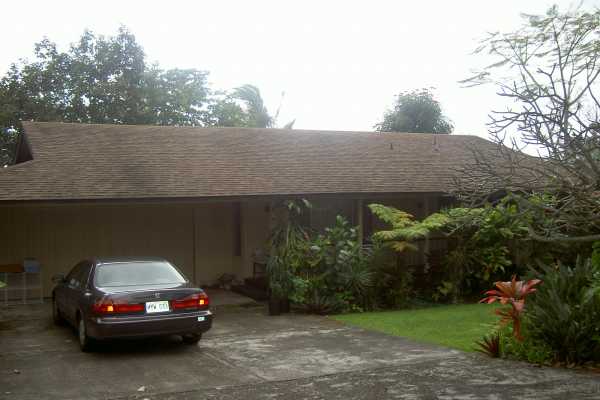 81-6247 Piko Road Captain Cook, HI 96704 - Photo 5 of 13 a car parked in front of a house